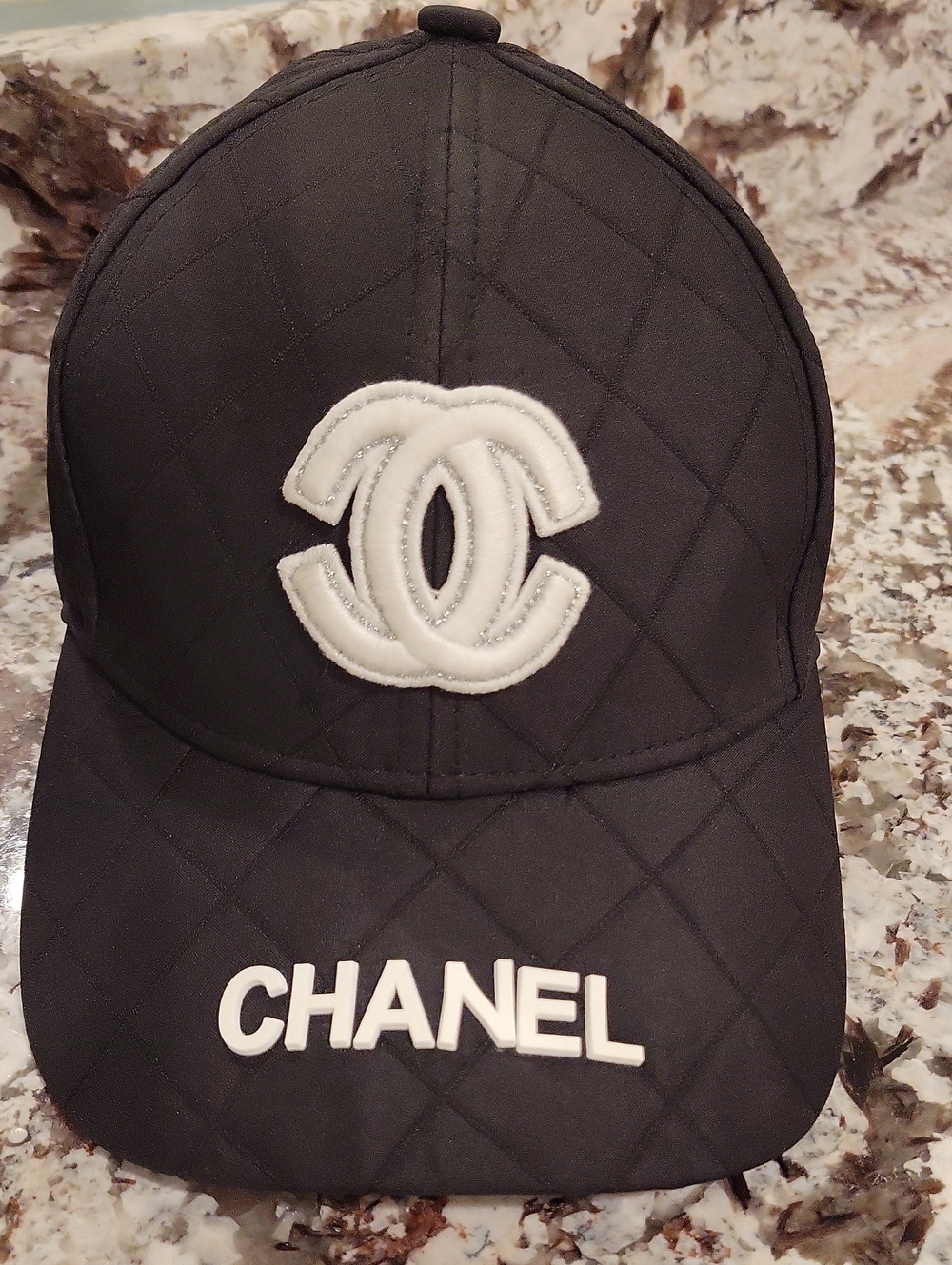 CHANEL Black Cap with White CC Logo